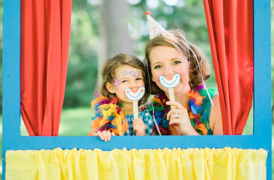 fourth birthday party carnival fun photo booth kids party planner